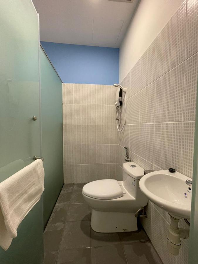 Benutten 99 Hotel Kampong Parit Tengah Buitenkant foto